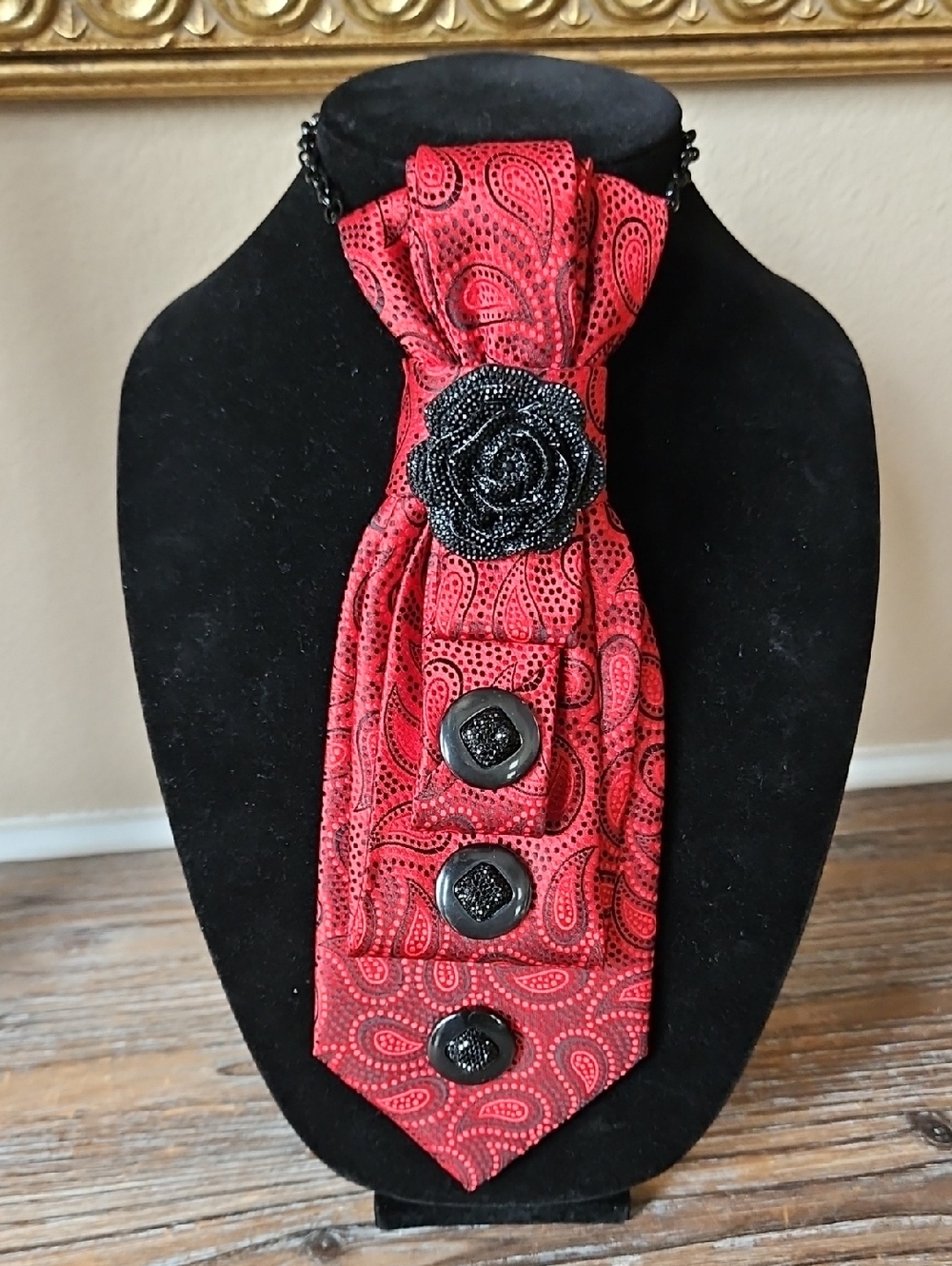 Red Paisley Necktie Necklace with Black Flower Accent